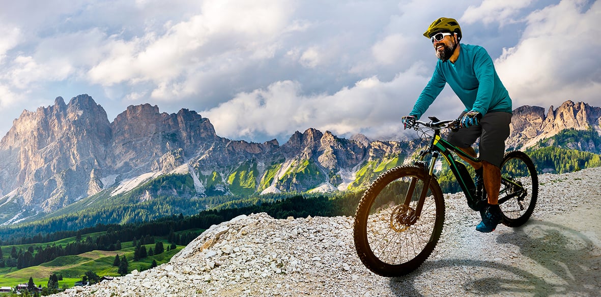 Image of e-bike demonstrating micro-mobility solutions in a rugged mountain terrain.