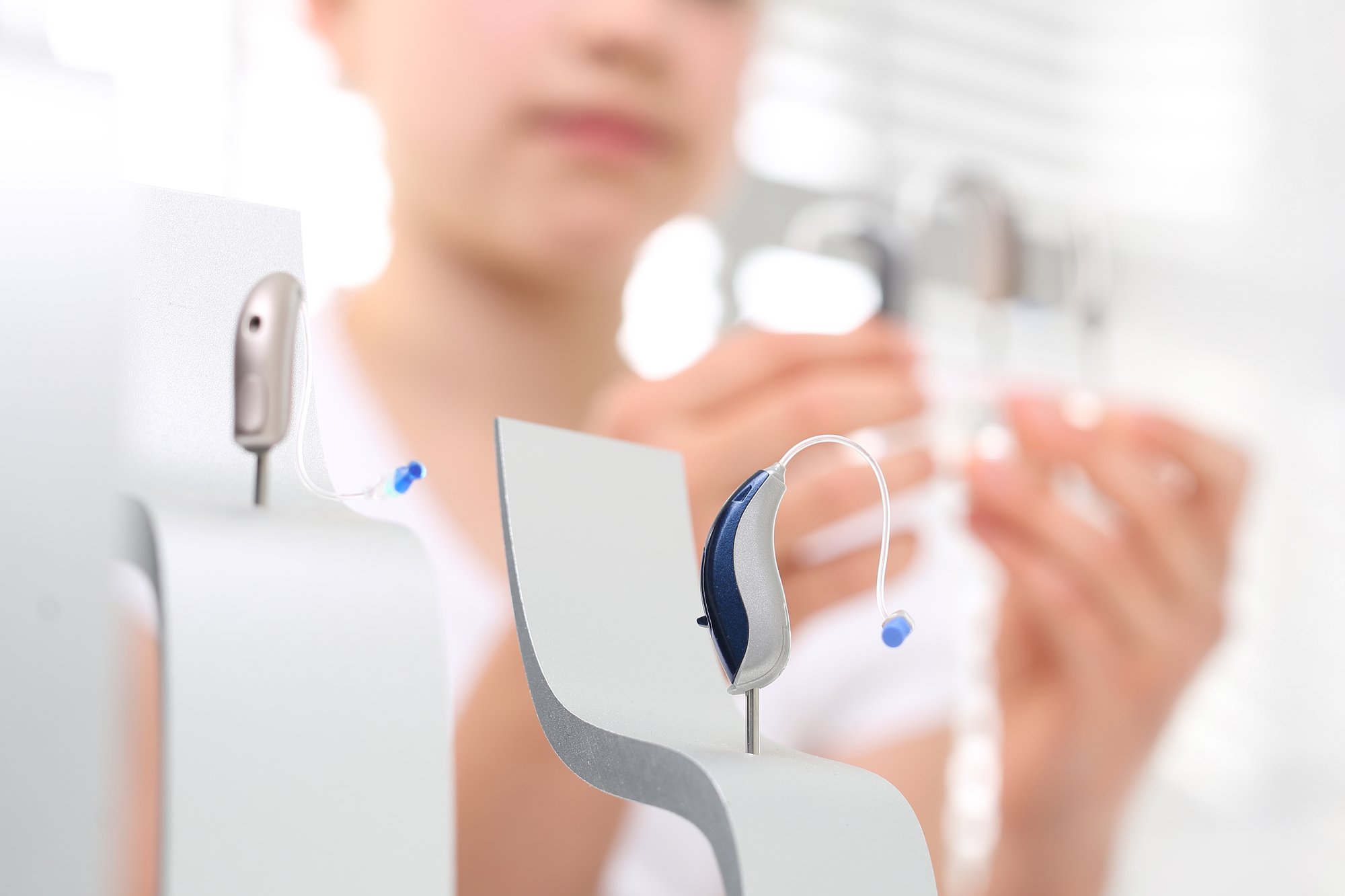 Advanced hearing aid technology, showcasing sleek design and miniaturized components.